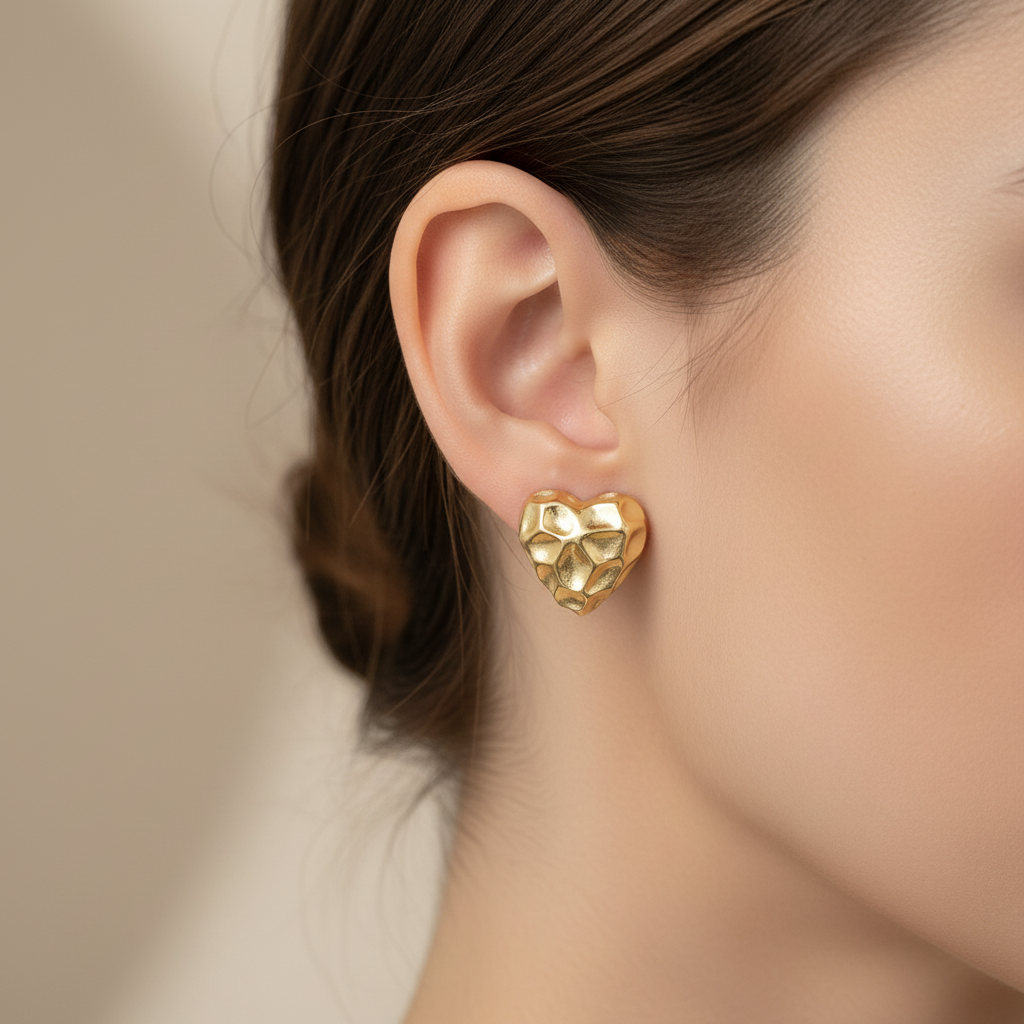 Pendientes corazón texturizado dorados