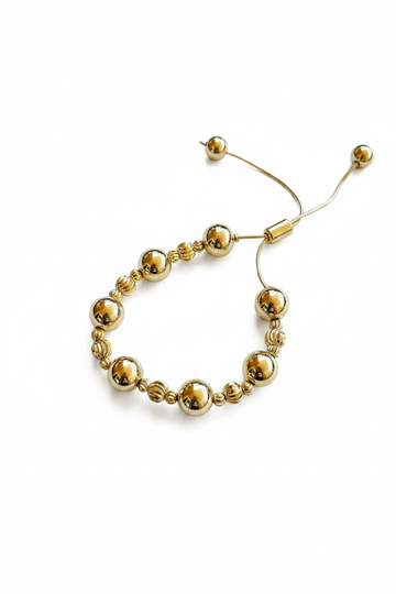 Pulsera de Esferas Doradas