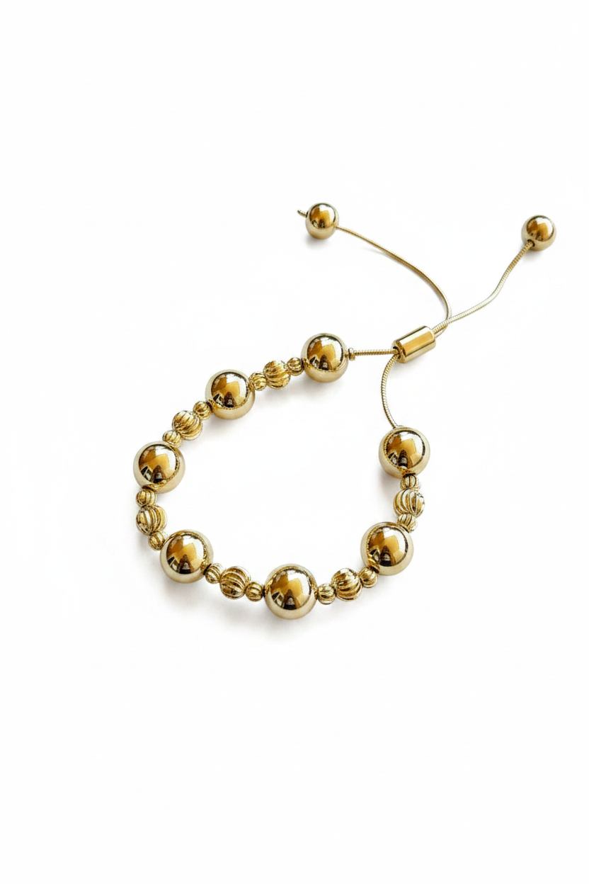 Pulsera de Esferas Doradas