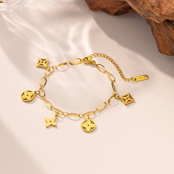Pulsera Dorada con Charms de Flores | Acero Inoxidable