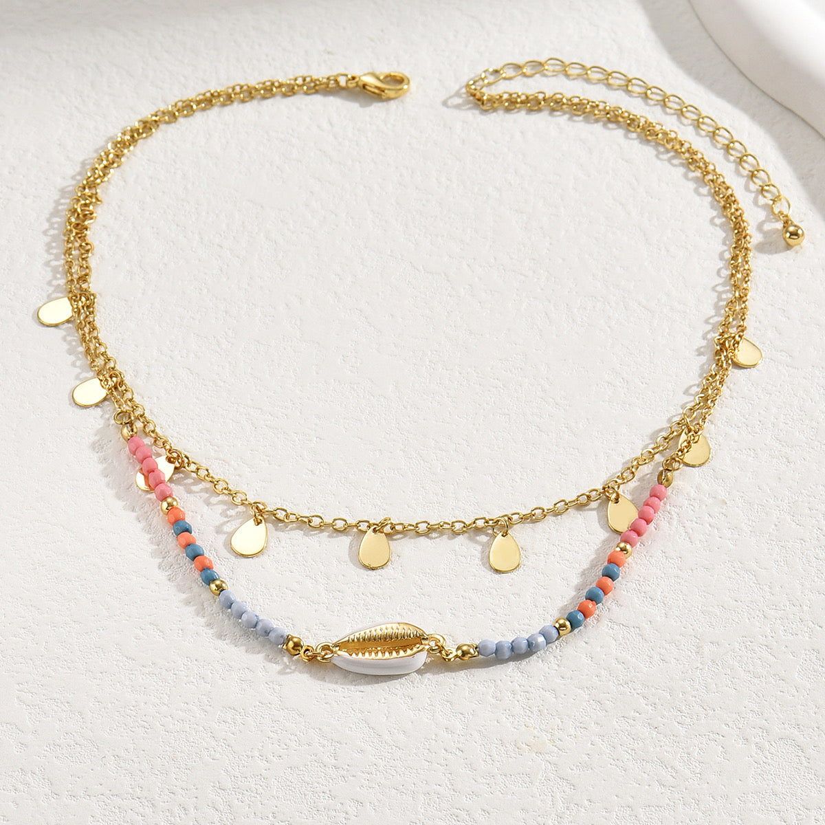 Collar Doble Capa Dorado con Cuentas de Colores y Concha