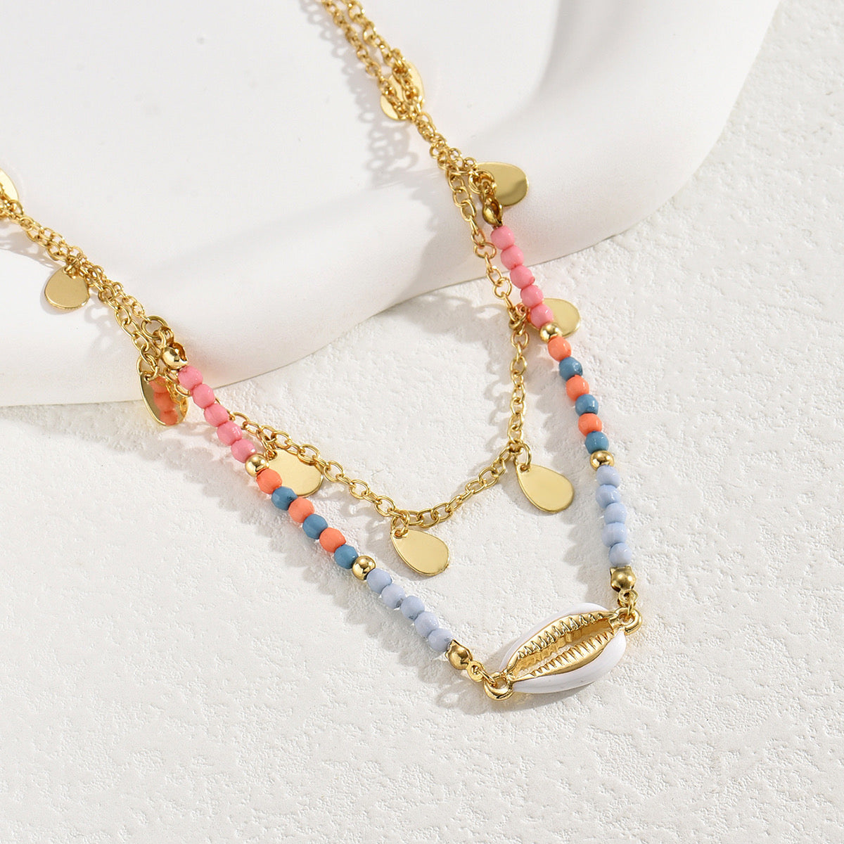 Collar Doble Capa Dorado con Cuentas de Colores y Concha