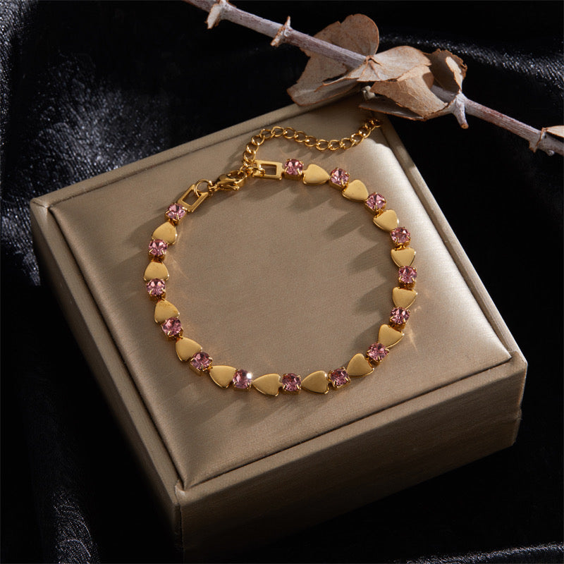 Pulsera dorada con circon y cadena deslizante