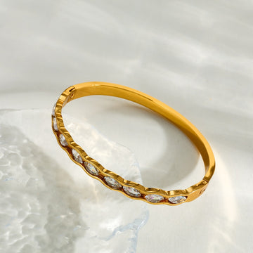 Brazalete Ondulado Dorado con Circonitas Marquesa