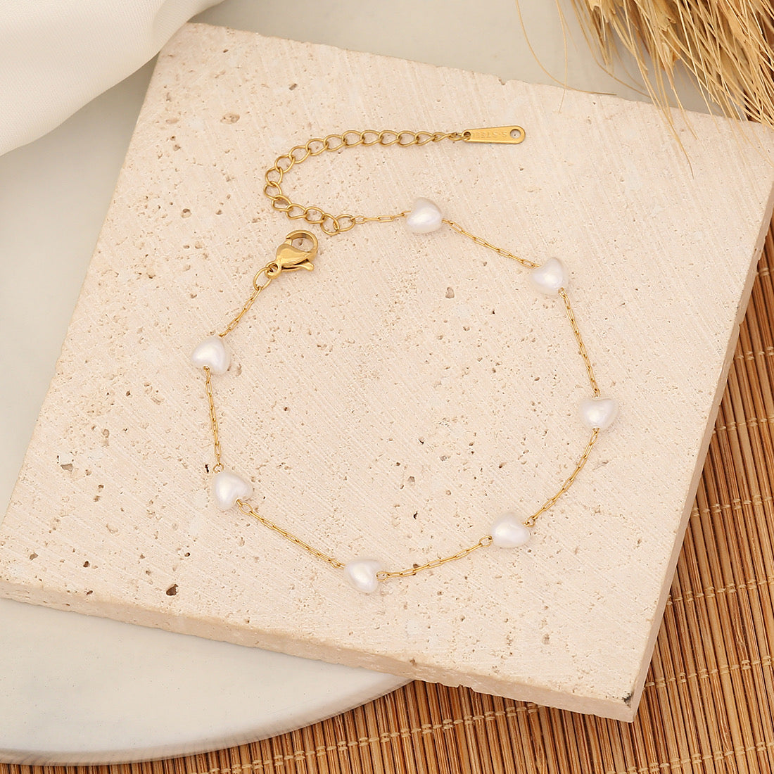 Brazalete con perlas de corazón